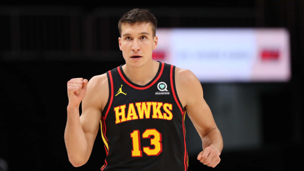 Bogdan Bogdanović Atlanta Hawks celebrating confidently on basketball court dynamic wallpaper