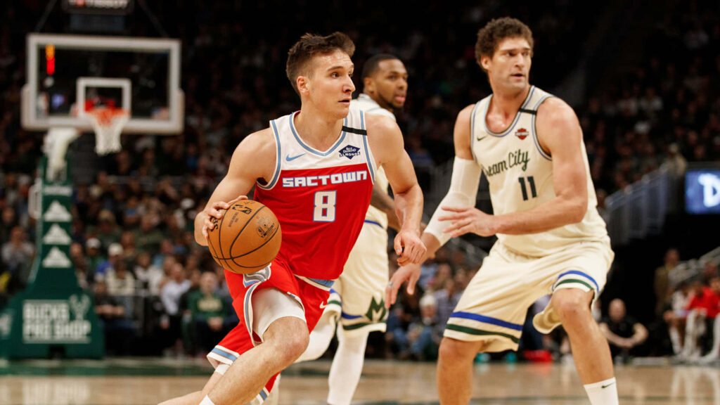 Bogdan Bogdanović Kings number 8 dribbling versus Bucks Brook Lopez number 11 defense NBA wallpaper