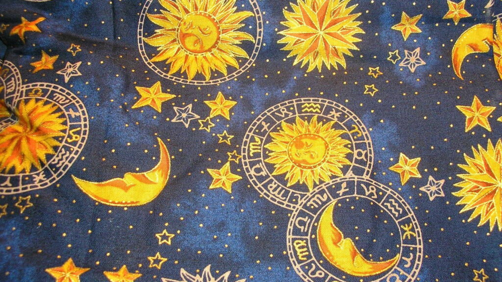 Heavenly Harmony: A Boho Delight in Sun, Moon, and Stars Wallpaper