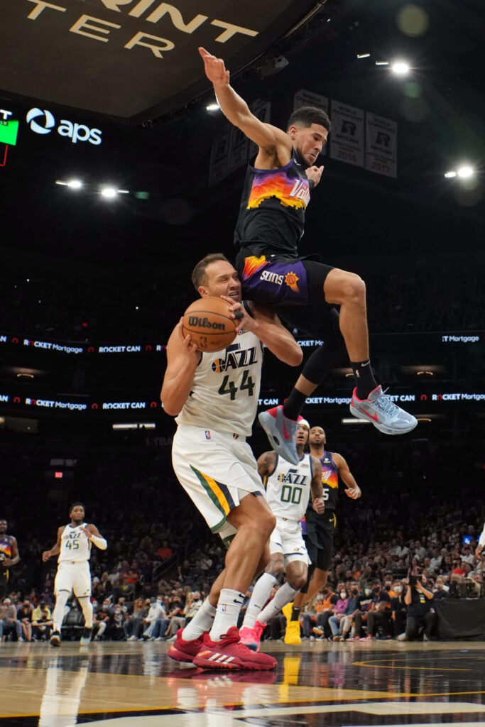Bojan Bogdanović intense NBA Utah Jazz action moment with packed arena basketball wallpaper