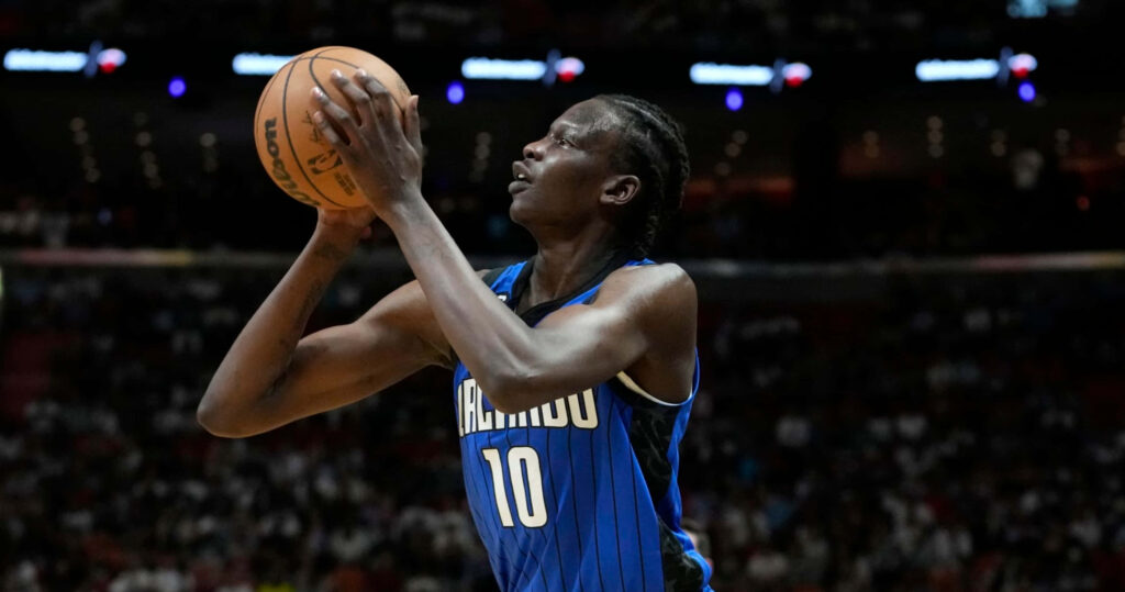 Bol Bol Orlando Magic basketball action mid-play intense focus blue black jersey NBA wallpaper