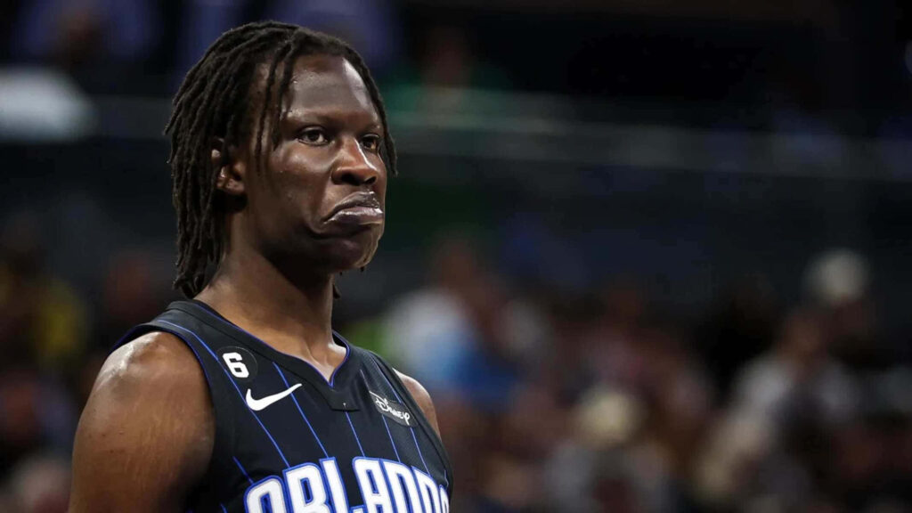 Bol Bol Orlando Magic focused game-day action in official blue black jersey basketball wallpaper