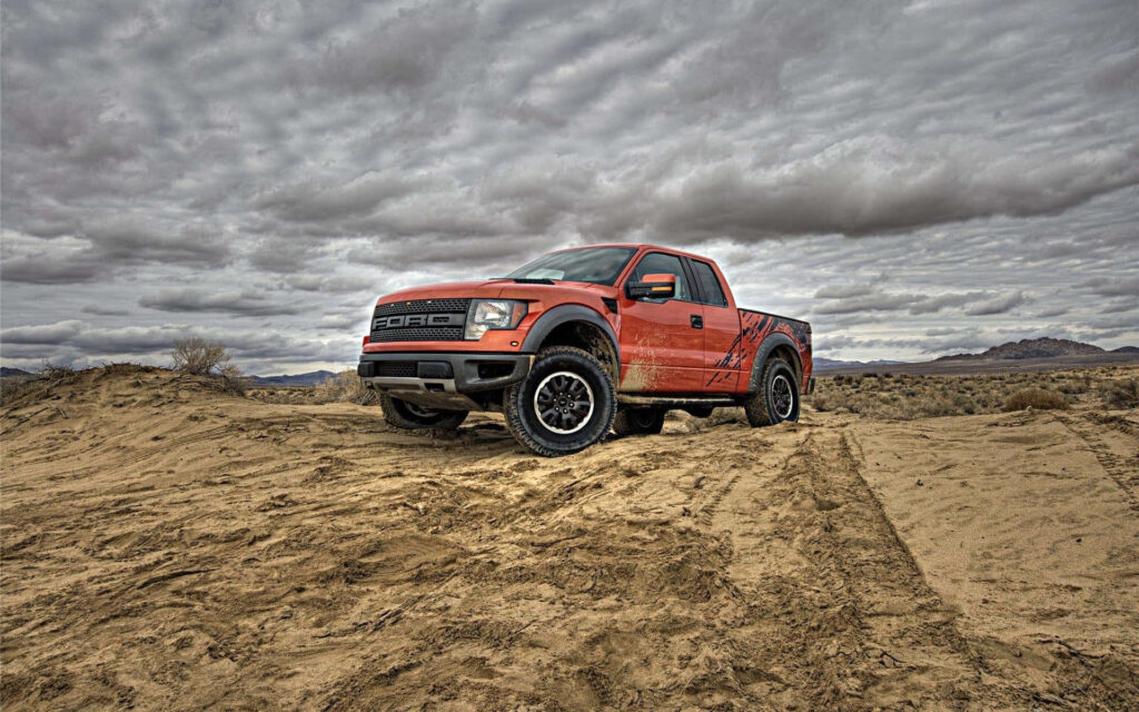 Bold 2013 Ford F-150 SVT Raptor Off-Road Wallpaper Background