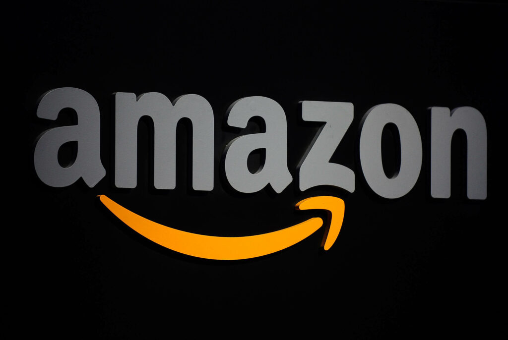 Bold Black and Orange Amazon Prime Wallpaper with Edgy Logo Edit