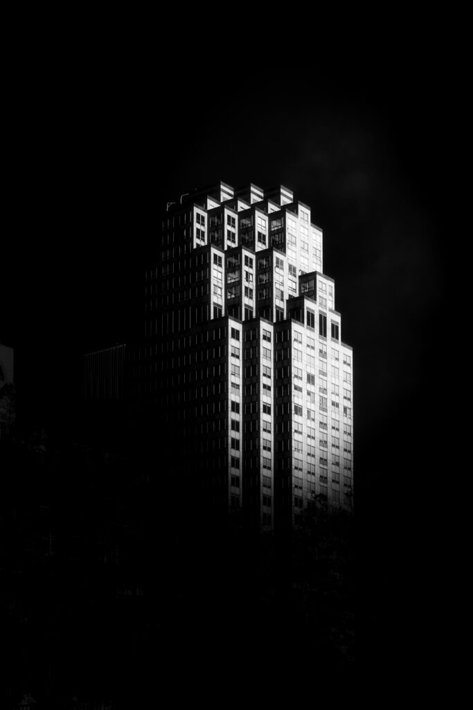 Bold Black and White Skyscraper Wallpaper: Minimalist Architecture Background