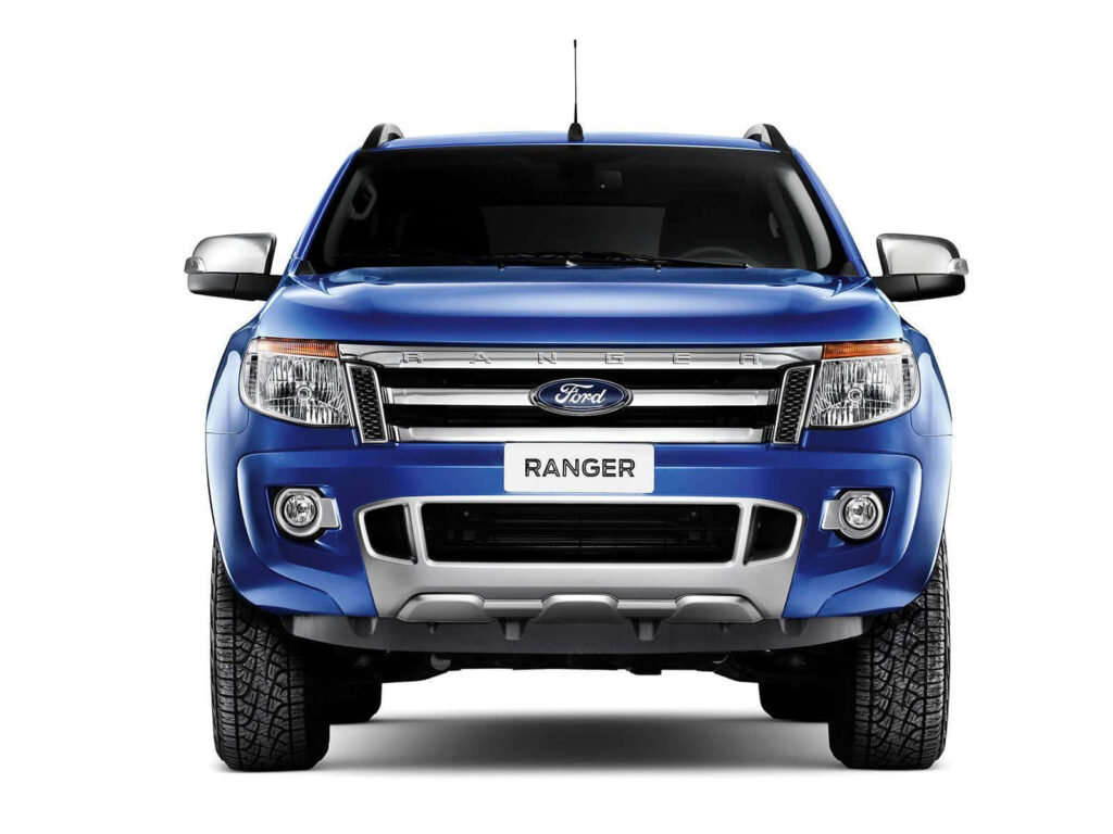 Bold blue Ford Ranger front view showcasing rugged design and powerful stance wallpaper background