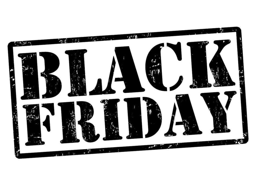 Bold Black Friday stamp with distressed texture on wallpaper background for major sales events
