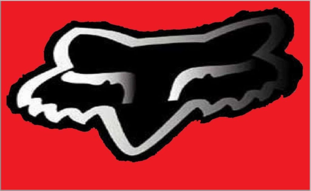 Fox Racing wallpaper with bold black white Fox Head logo on vibrant red background for motocross fans