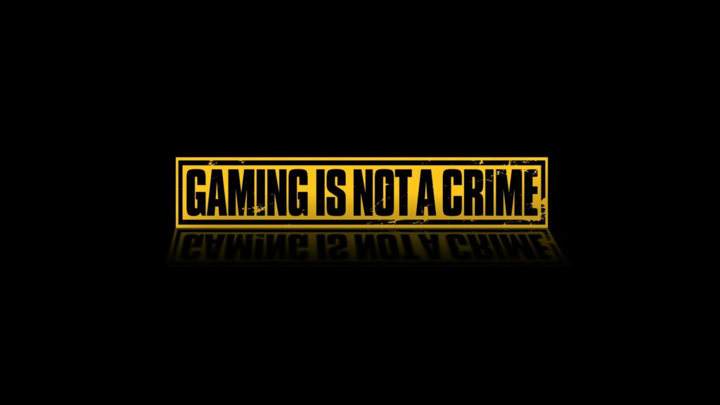 Bold 'GAMING IS NOT A CRIME' Wallpaper for Gaming Fans - High Res