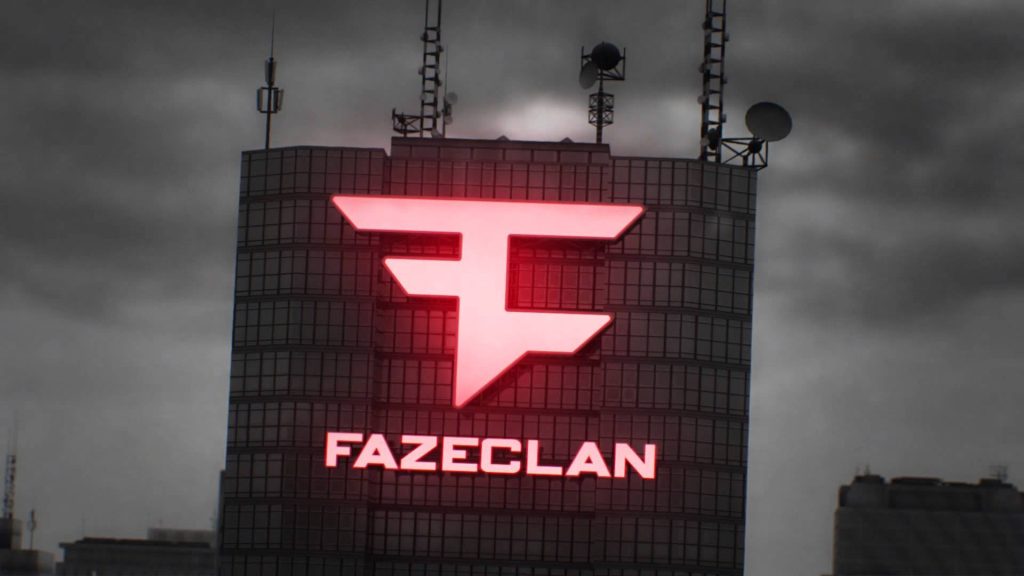 Glowing red FaZe Clan logo atop dark skyscraper with moody overcast urban sky background wallpaper