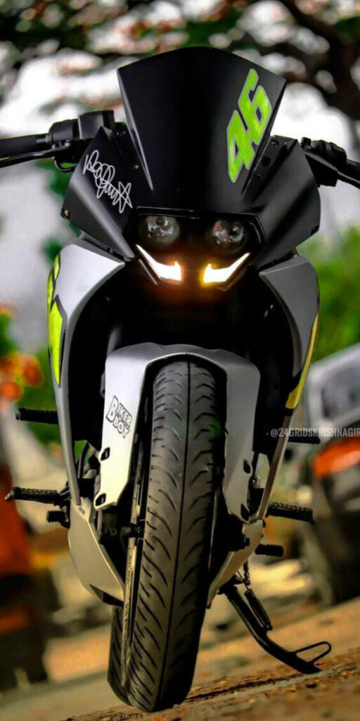 Bold KTM RC 200 Wallpaper: Scenic Background & Aggressive Design