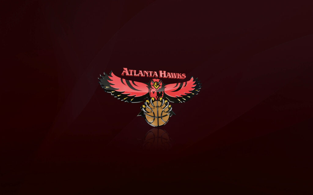 Atlanta Hawks maroon wallpaper with iconic hawk gripping basketball centered background