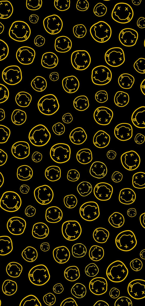 Bold Nirvana Wallpaper: Iconic Yellow Smiley on Black Background