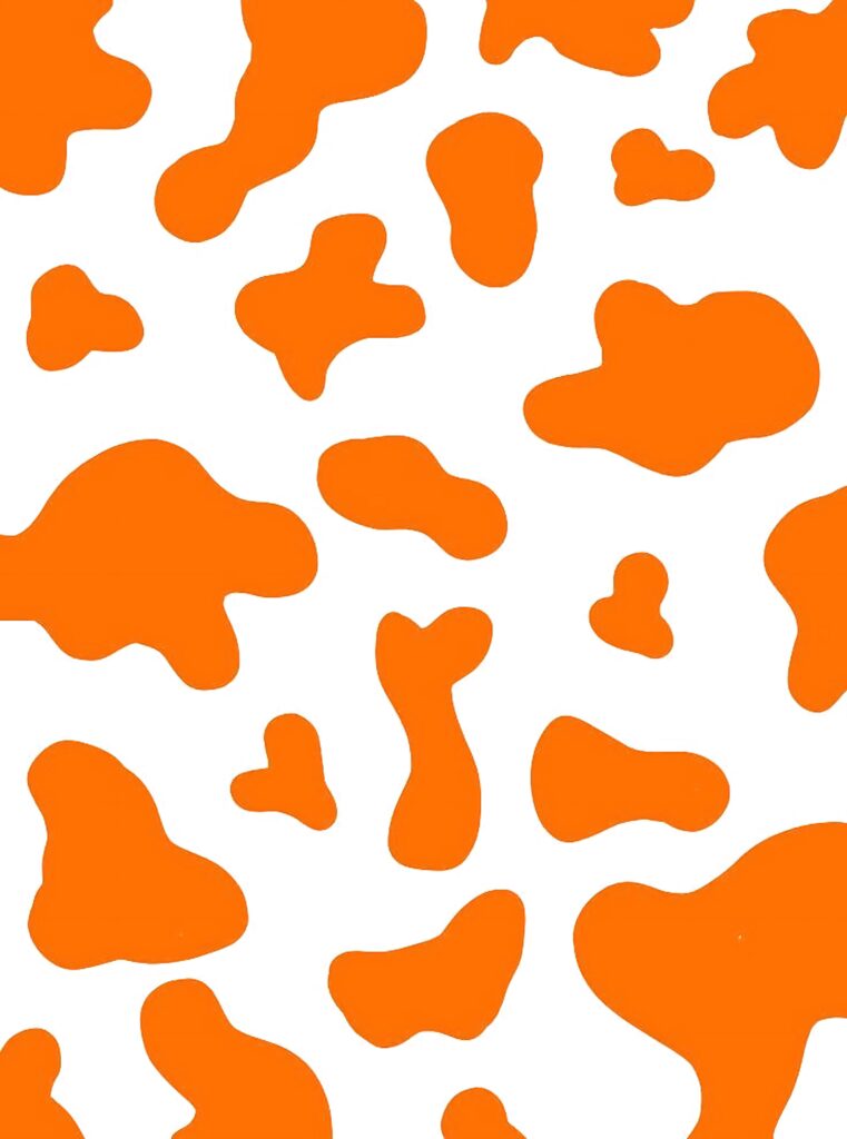 Bold orange cow print wallpaper with modern minimalist spots on clean white background design
