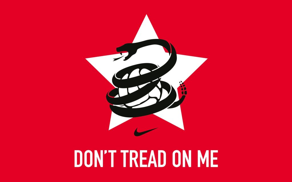 White star red background black snake coils white soccer ball Nike logo don't tread on me wallpaper