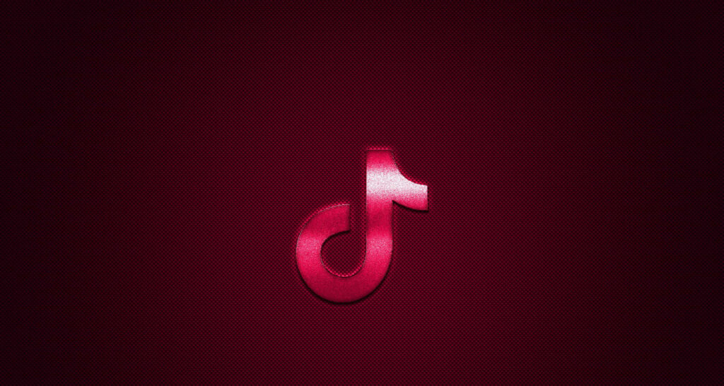 Bold red TikTok logo on textured dark red background stylish TikTok app wallpaper design