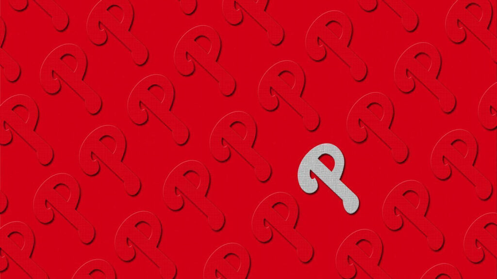 Bold Red Wallpaper with Embossed 'P' Design & Silver Accent