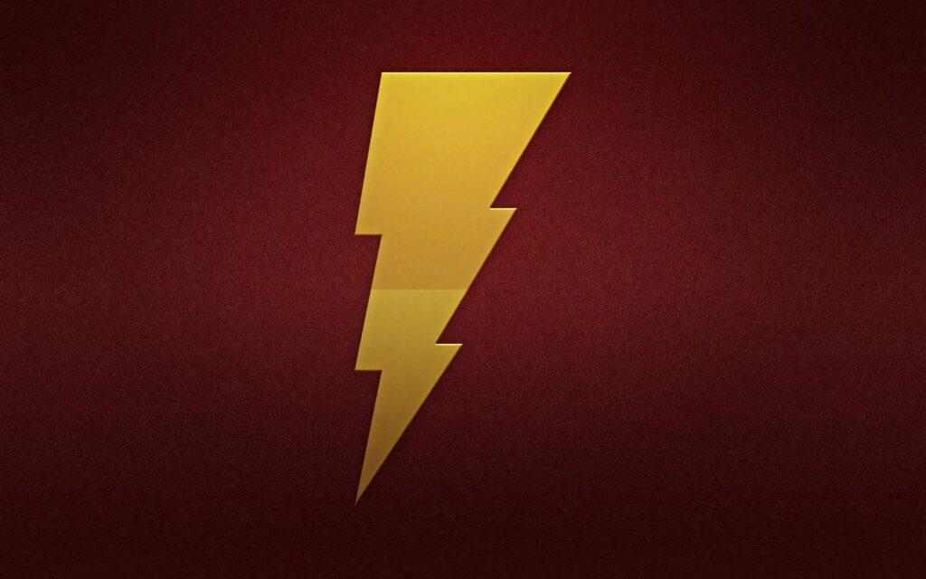 Shazam Thunderbolt logo on deep red textured background vibrant dynamic superhero wallpaper