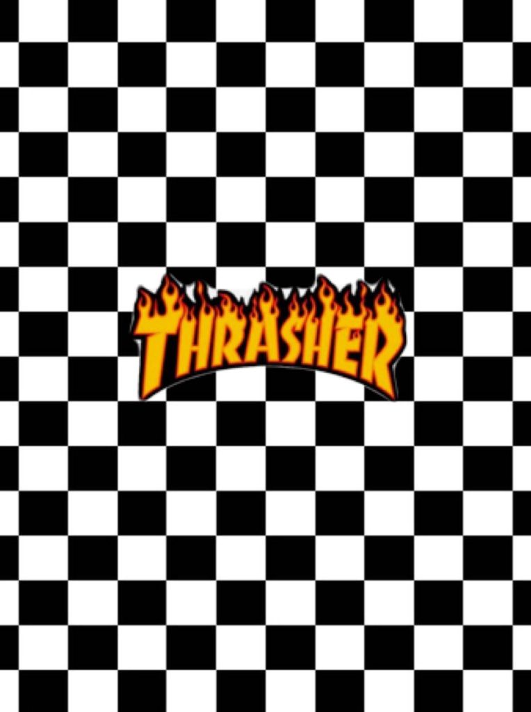 Thrasher flaming logo on black and white checkerboard background edgy skate wallpaper