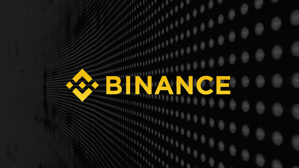 Bold yellow Binance logo and name on textured black perforated modern wallpaper background
