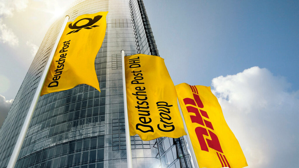 Bold yellow Deutsche Post and DHL flags wave by glass skyscraper symbolizing logistics growth Wallpaper