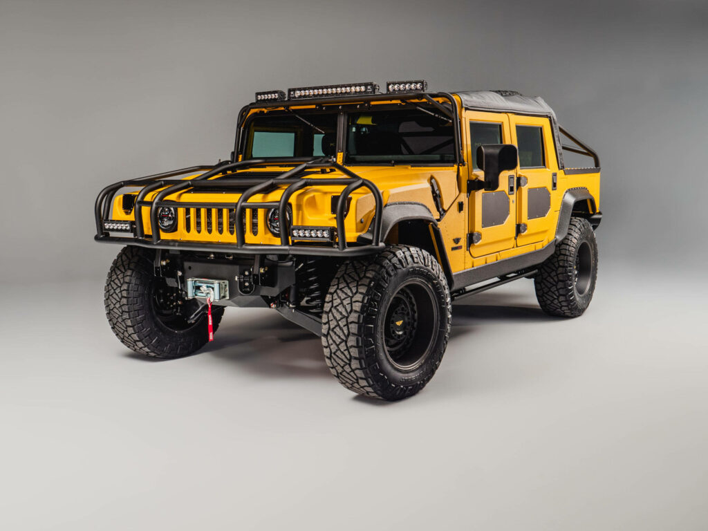 Bold Yellow Hummer H1 Wallpaper: Off-Road Adventure Background
