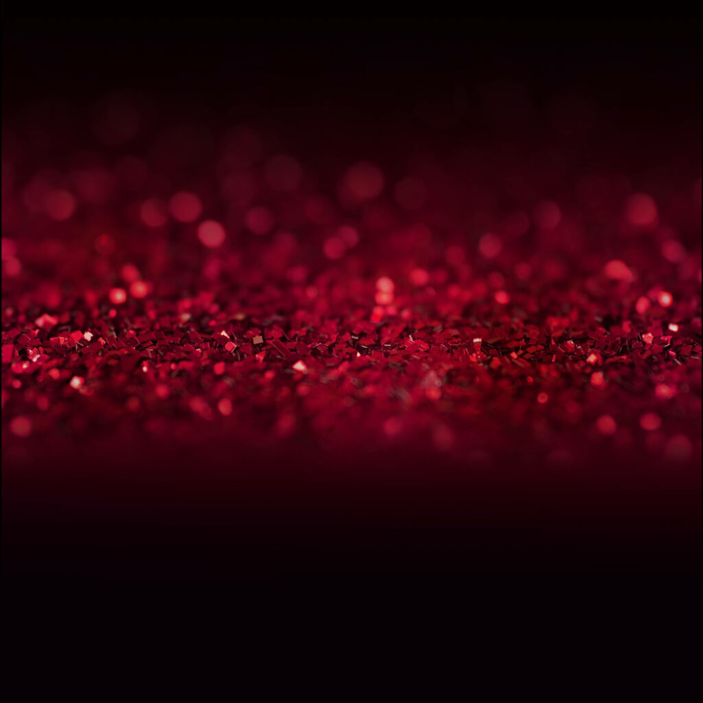 Bold and Glittery: Elevate Your Designs with Fiery Red Sparkles! Wallpaper