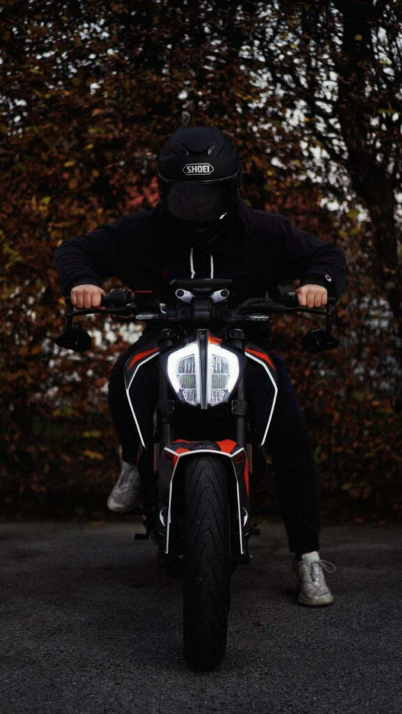 Dynamic Black Rider on KTM | Striking iPhone Wallpaper Background