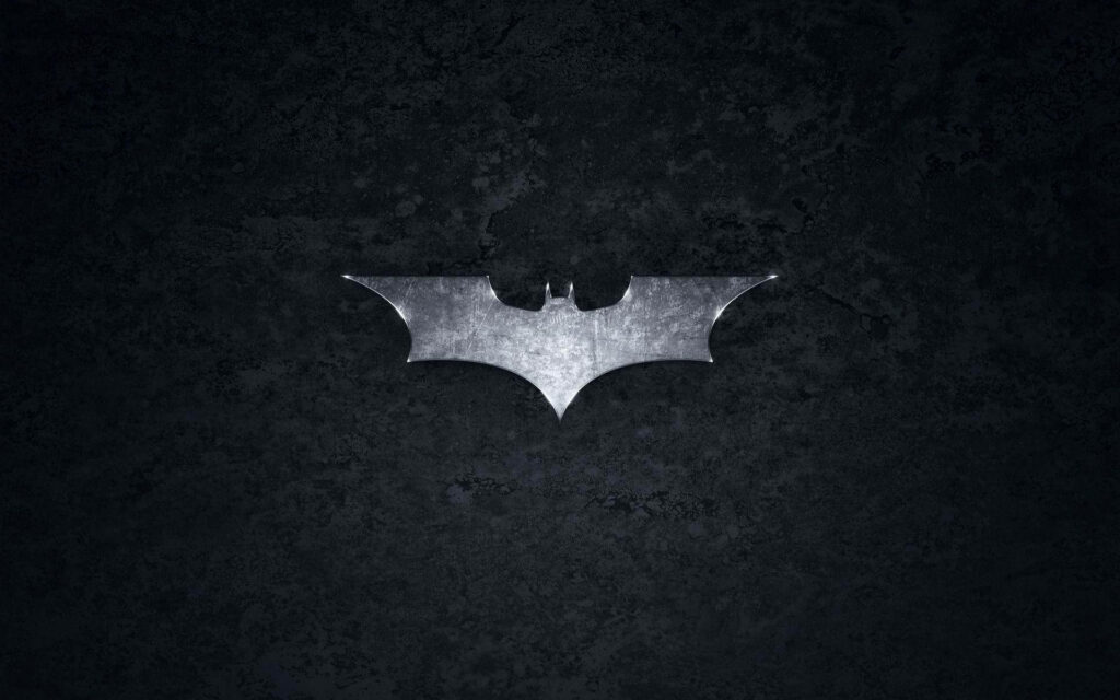 The Dark Knight Emblem: Batman's Iconic Symbol on a Textured Black Cool Logos Background Wallpaper