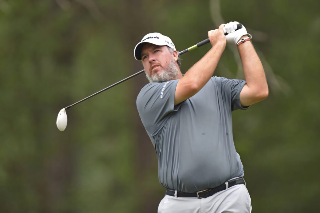 Boo Weekley mid-swing golf action on lush green course professional golfer wallpaper