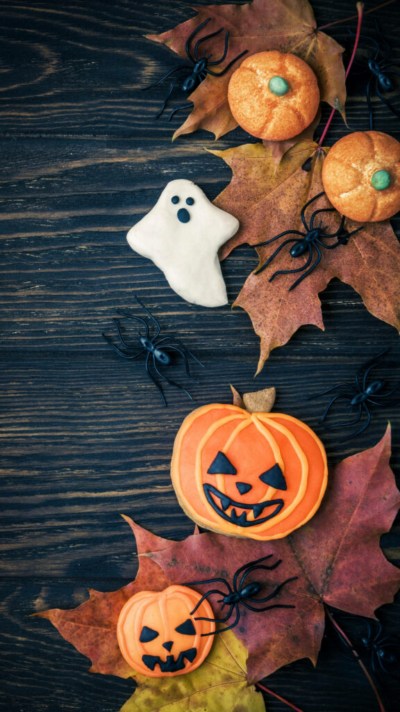 Spooktacularly Cute: Halloween-themed Phone Dressed to Impress! Wallpaper