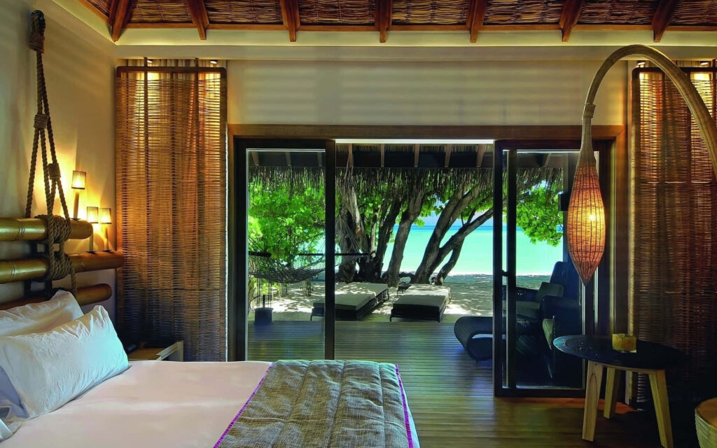 Bora Bora wallpaper serene beachfront tropical bungalow morning sun turquoise water greenery