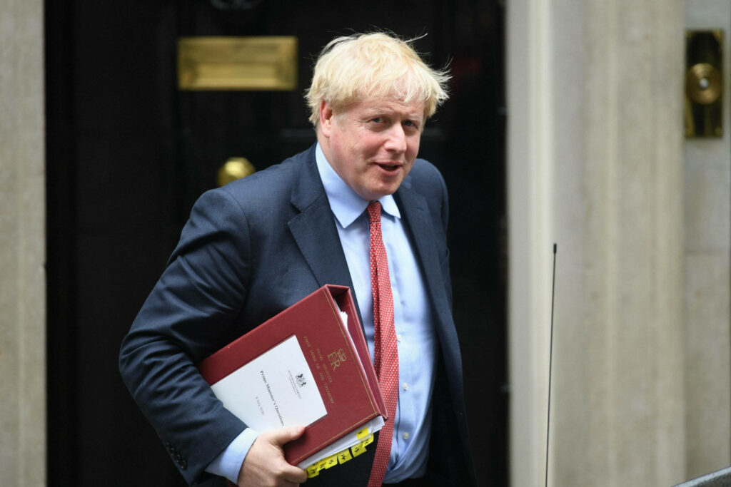 Boris Johnson holding government documents outside 10 Downing Street historic British architecture wallpaper