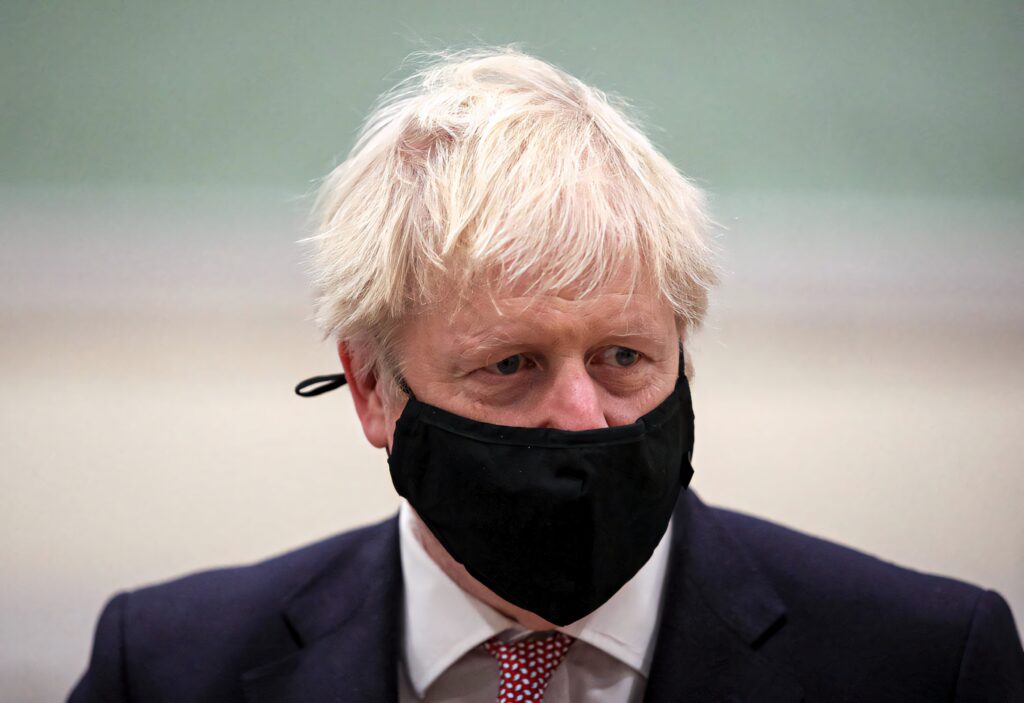 Boris Johnson in formal suit wearing black mask high resolution portrait leadership pandemic safety Wallpaper