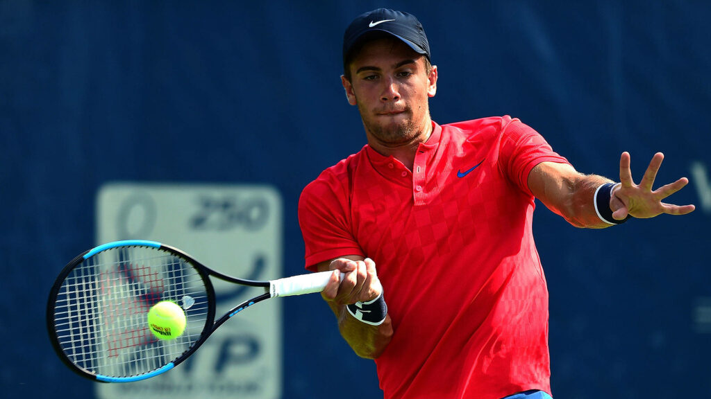 Borna Coric tennis forehand action vibrant red blue court sports wallpaper background