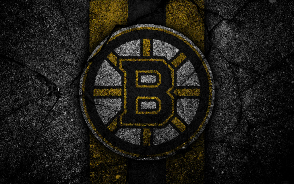 Boston Bruins logo on distressed asphalt background black and gold rugged sports wallpaper