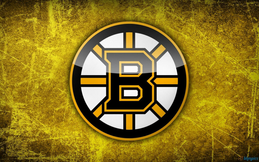 Boston Bruins logo wallpaper with textured yellow and black background in high-definition clarity