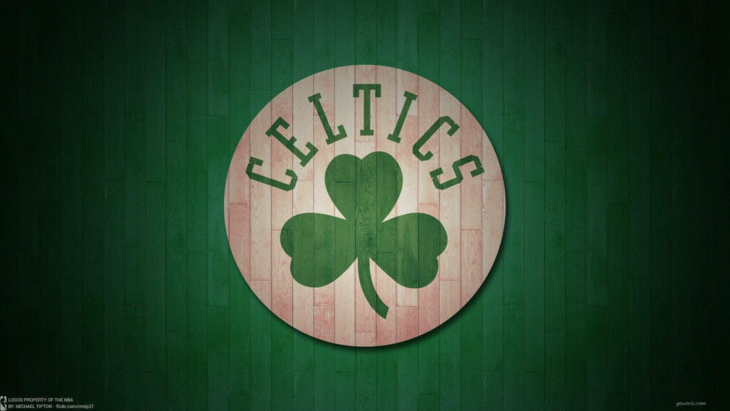 Boston Celtics wallpaper with green shamrock logo on textured wood background vibrant design