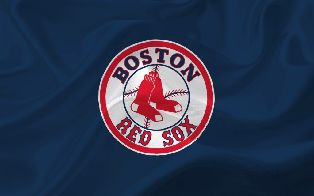 Boston Red Sox logo on flowing blue cloth background featuring iconic red socks emblem wallpaper