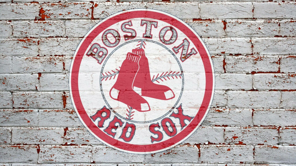 Boston Red Sox logo painted on rustic white brick wall vibrant textured sports wallpaper background