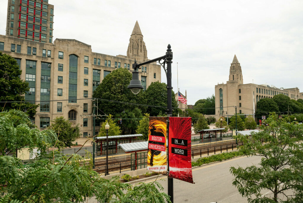Boston University Arts Building wallpaper with historic gothic stone architecture and lush green trees
