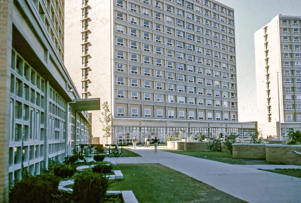 Boston University Warren Towers high-rise student residence with modernist design under clear sky Wallpaper