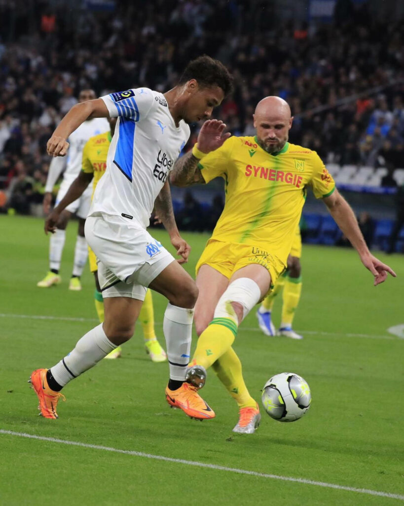 Boubacar Kamara midfielder in action vibrant football match high resolution soccer wallpaper background