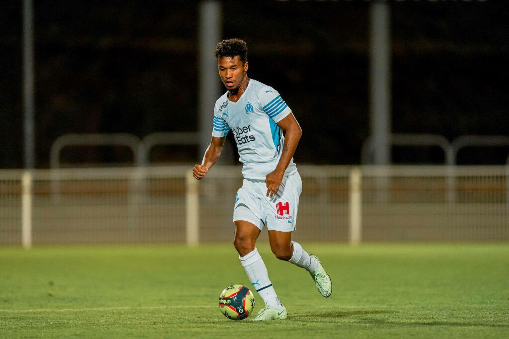 Boubacar Kamara Olympique de Marseille controlling ball focused expression stadium background Wallpaper