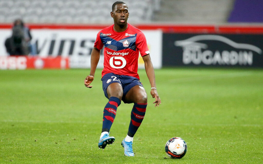Boubakary Soumaré Lille OSC in action on green pitch showcasing focus and athleticism wallpaper