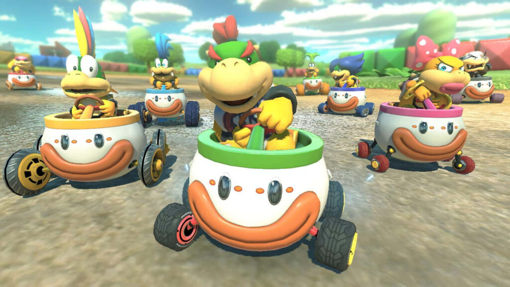 Bowser Jr and Koopalings race in colorful clown cars under bright blue skies in Mario Kart style Wallpaper