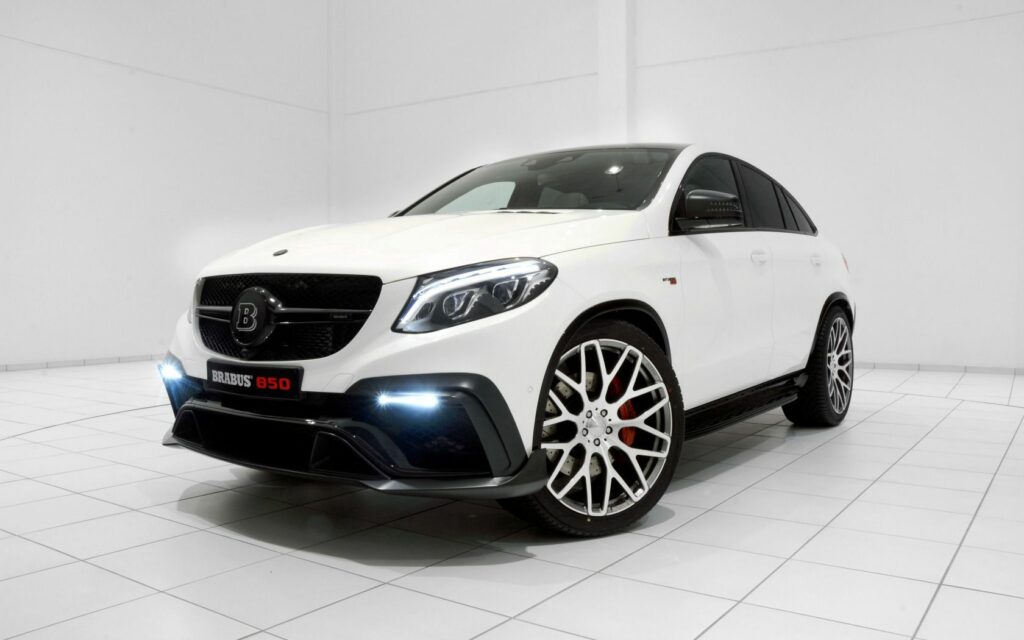 Brabus-Tuned White Mercedes-Benz AMG GLE-Class in Sleek Showroom Wallpaper