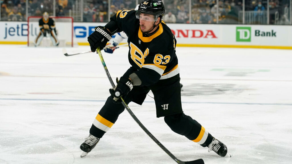 Brad Marchand Boston Bruins NHL action photo wallpaper number 63 black gold jersey close-up