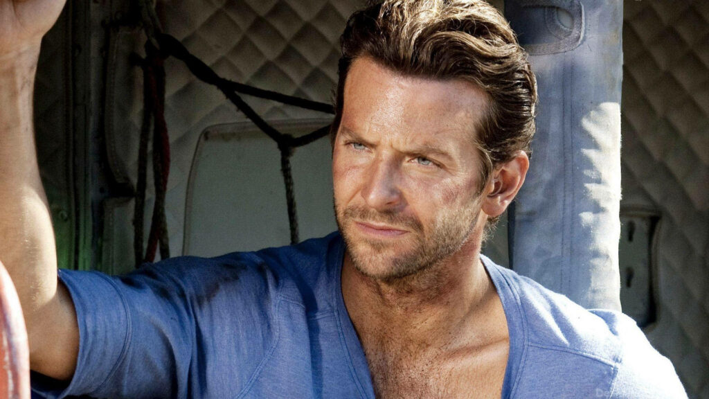 Bradley Cooper intense movie scene rugged background determined expression wallpaper