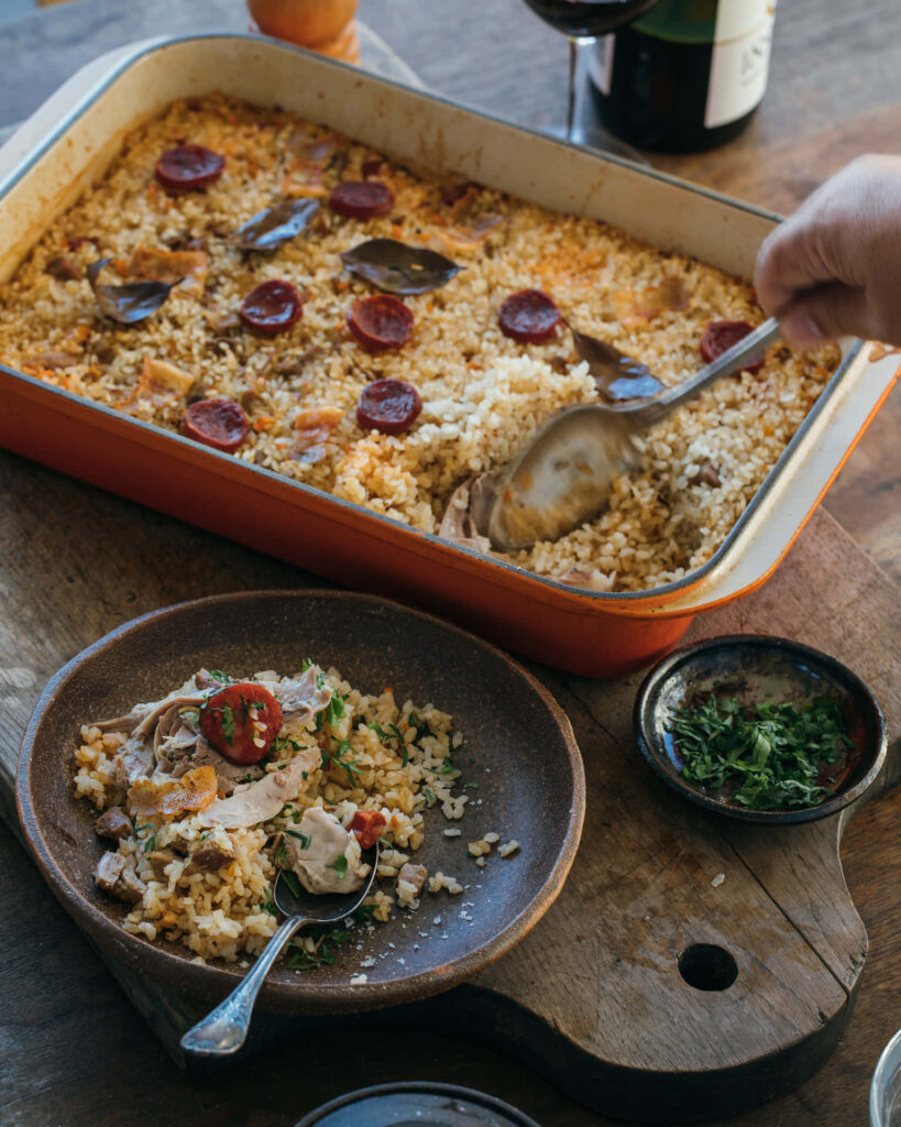 Warm Braga-Style Singaporean Duck Rice Wallpaper - Rustic & Inviting